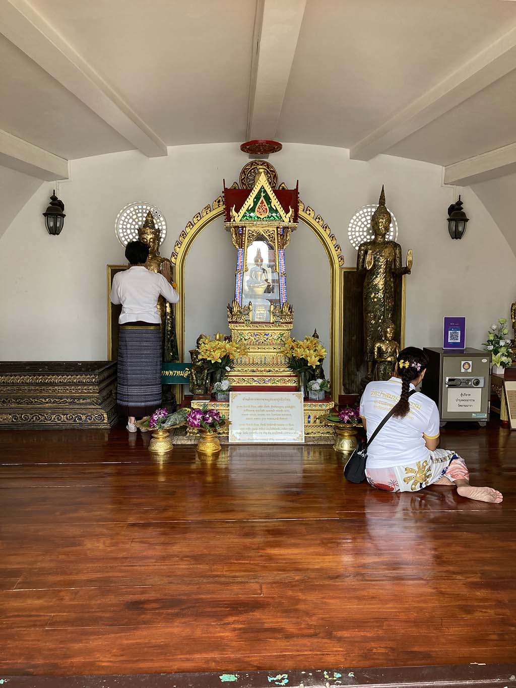 The Buddha statue in a room at the top of the deck