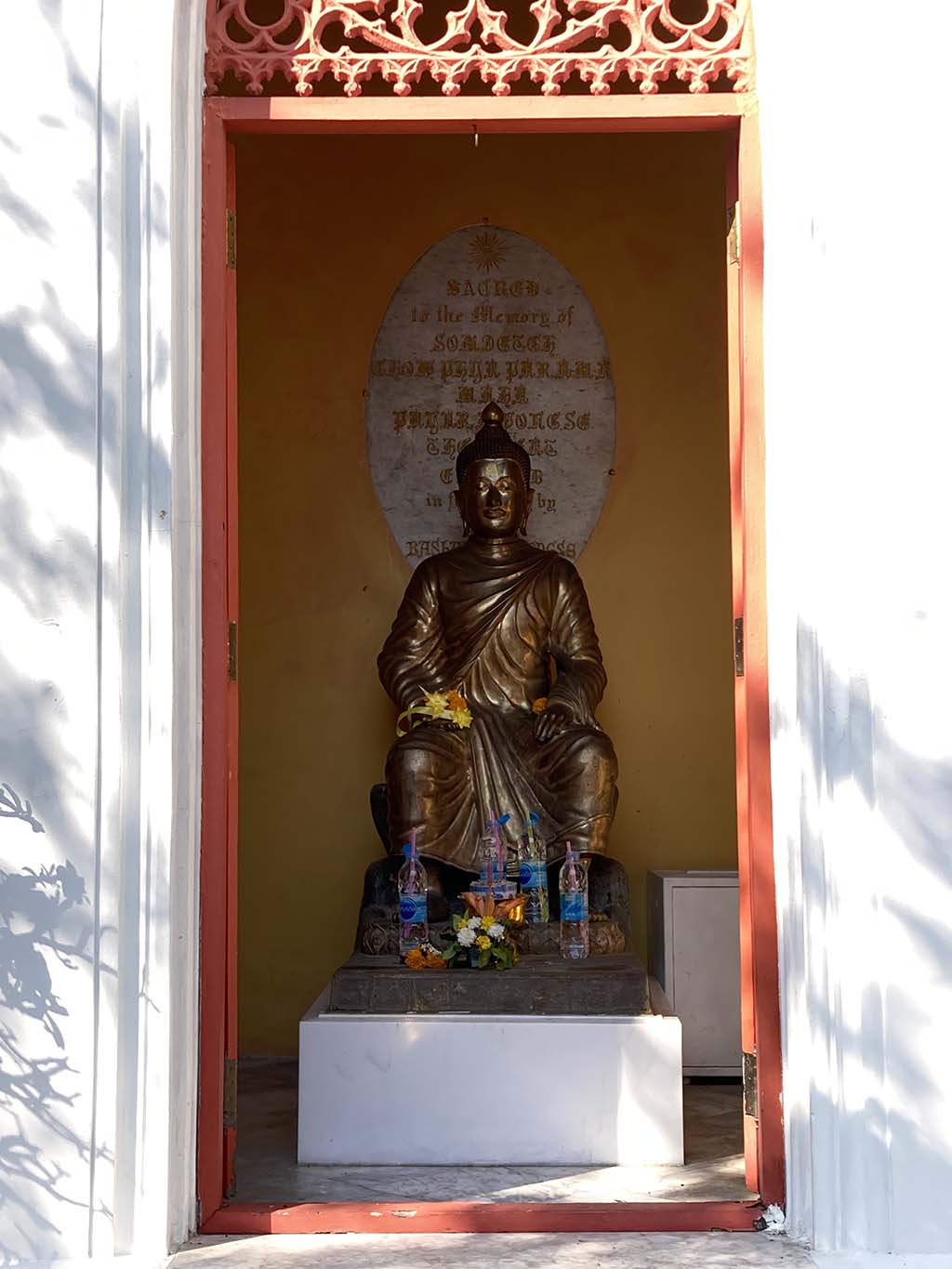 Indian style Buddha statue inside the Gothic-style Mandapa