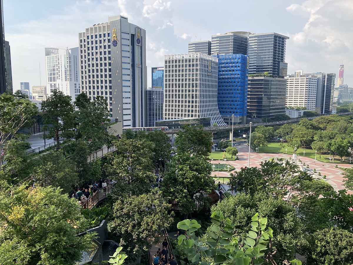 From the above, you will see the continuity of the green space between the Dusit Arun and Lumpini park below (the red tiles area).