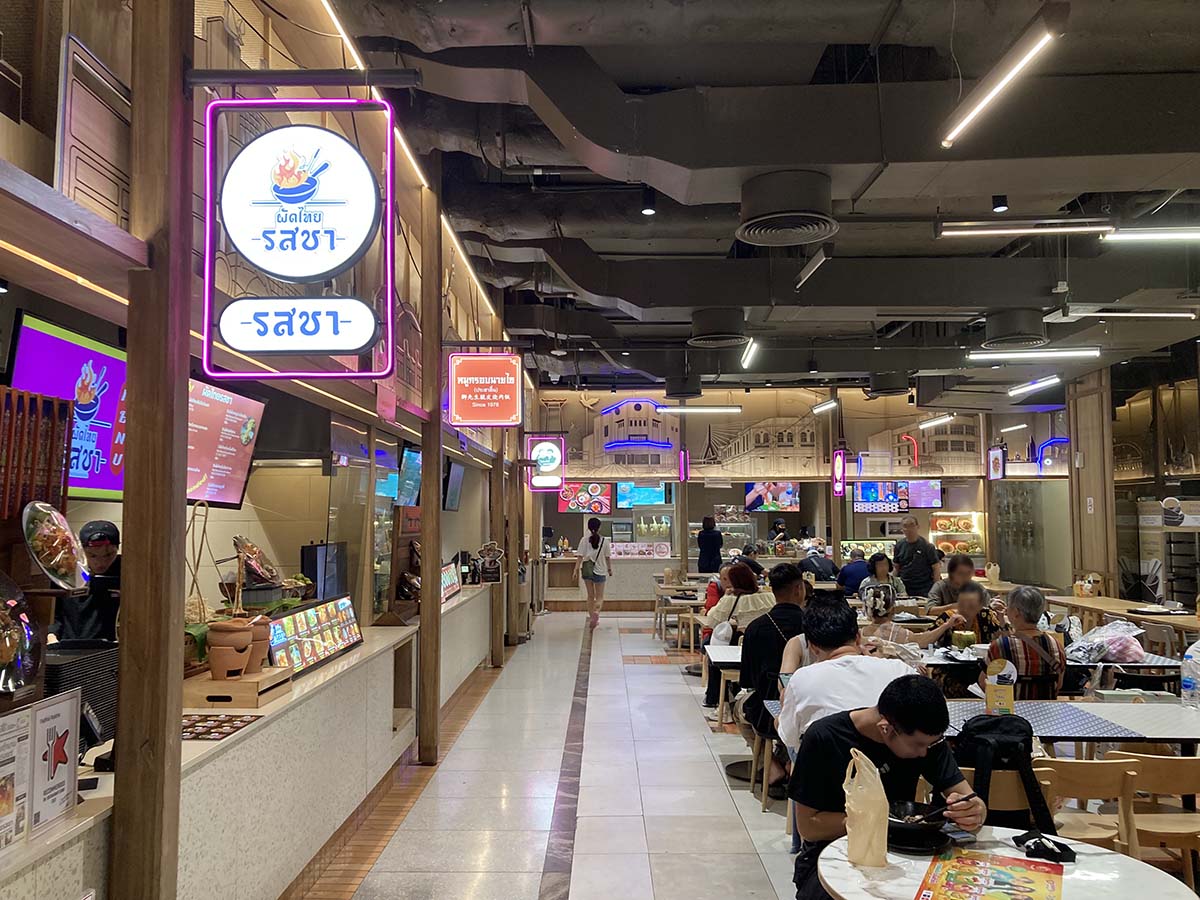 Many street food shops are here with some seating.