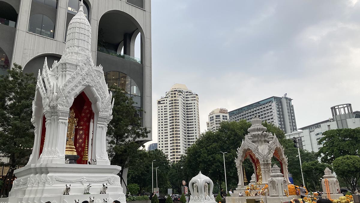 The white shrine on the left is Trimurti Shrine and the right one is Ganesha Shrine