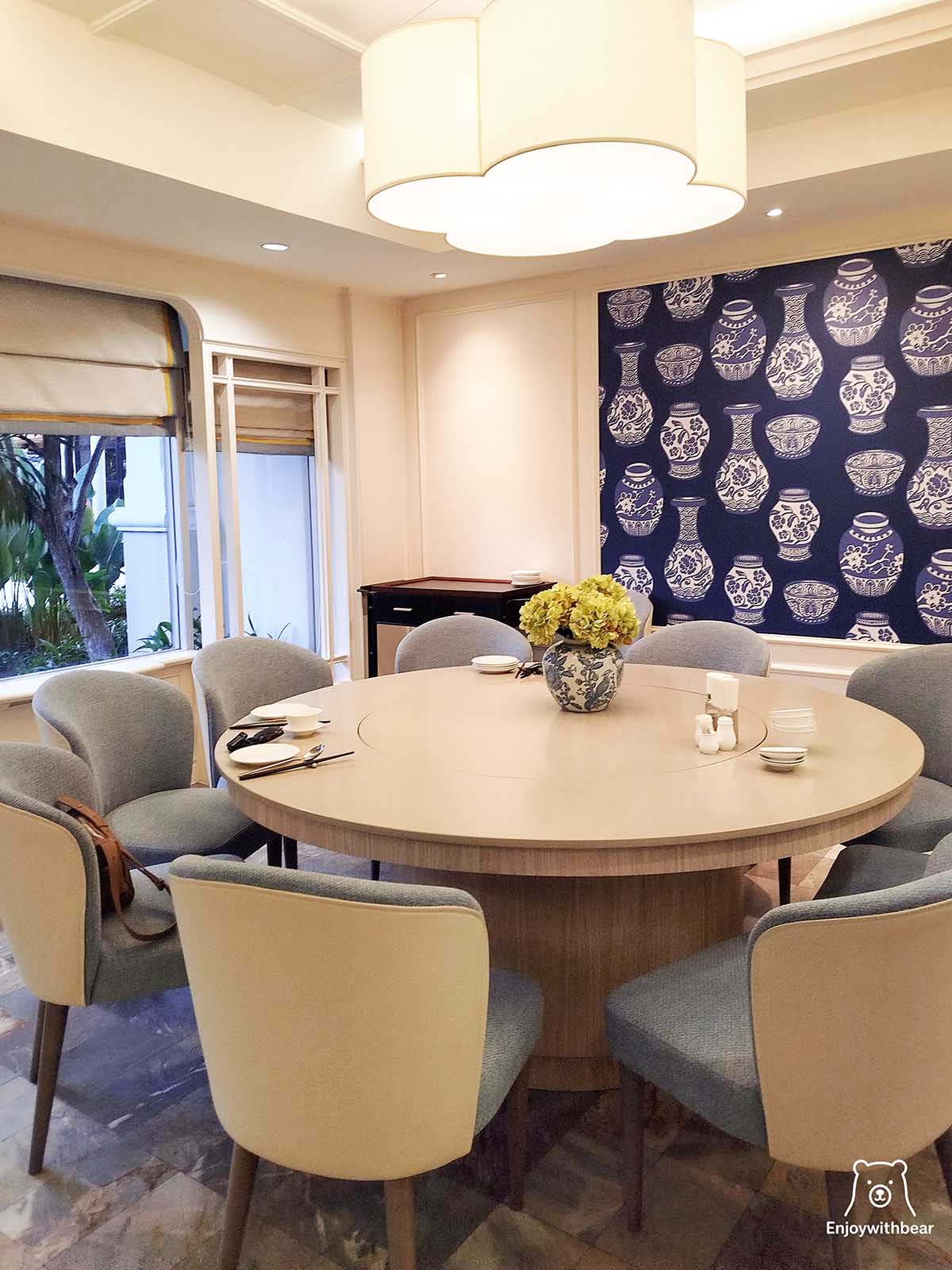 A beautifully bright dining space where modern comfort meets classic Chinese-inspired charm