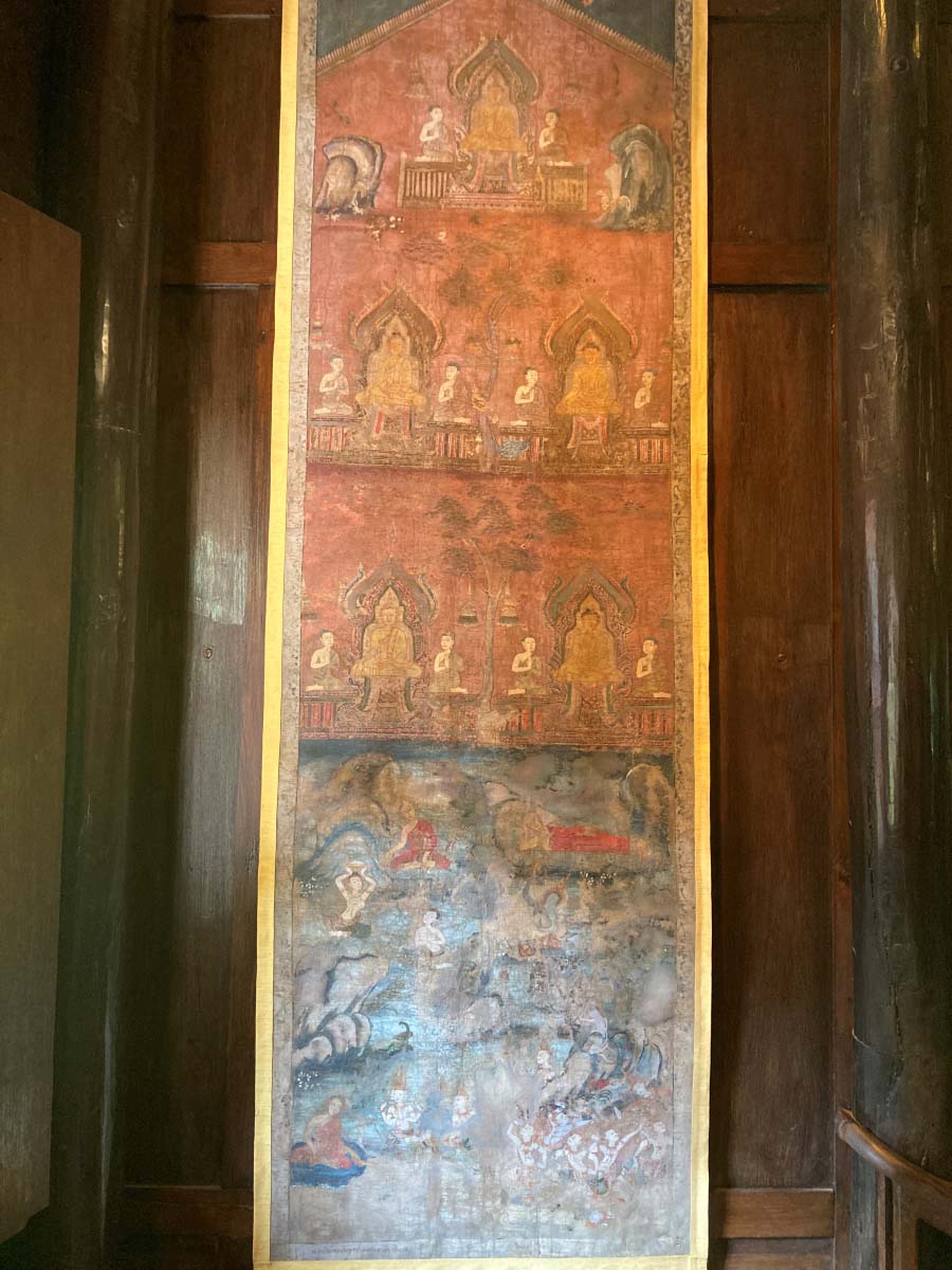 The story of the Buddha on an embroidered cloth.