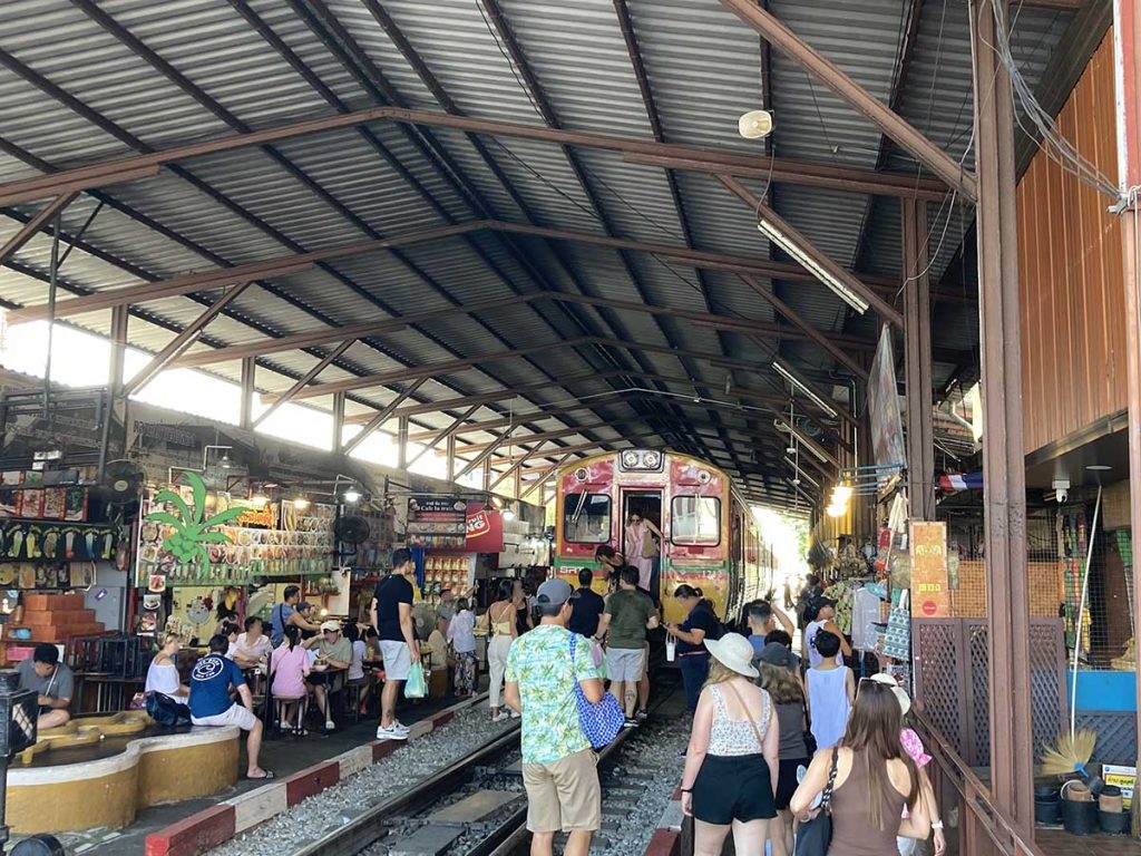 The train stops at the end of the market.