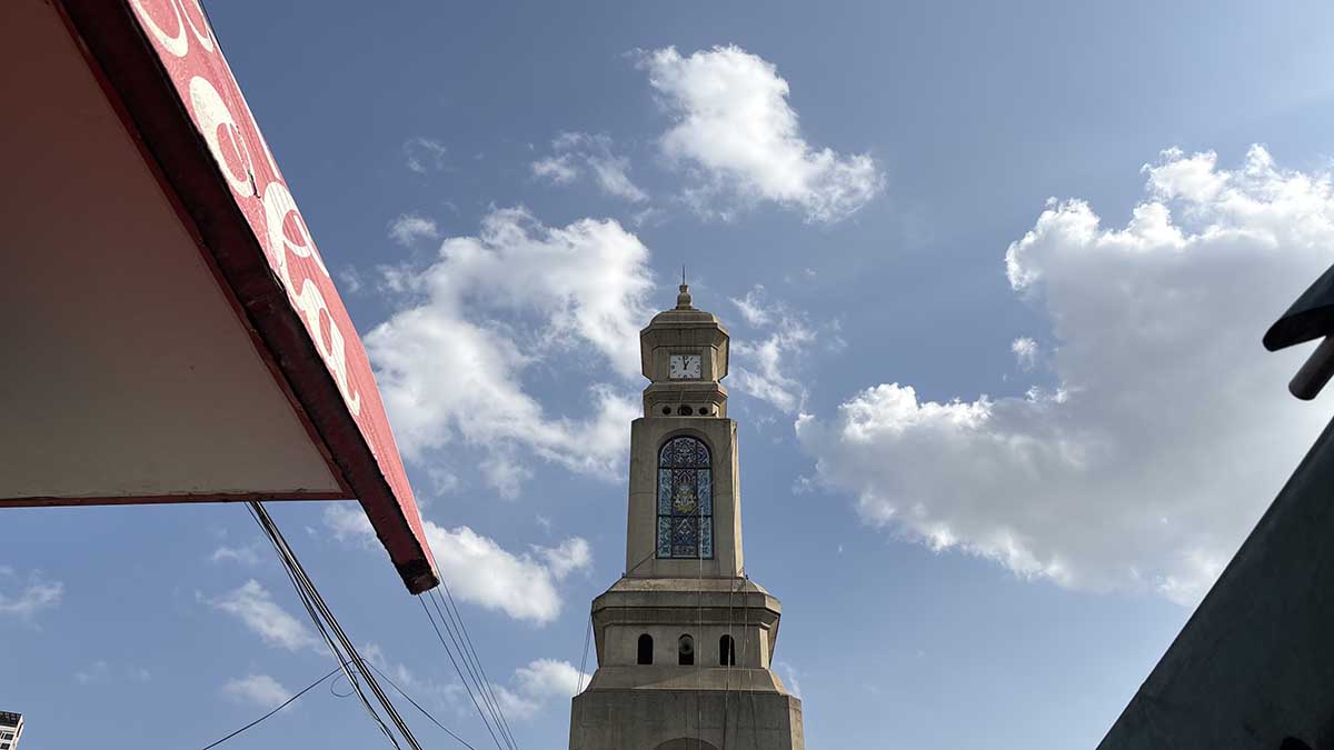 The clock tower landmark at the center of Chatuchak Weekend Market.